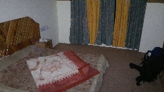 Rustikales Hotelzimmer in Mandi